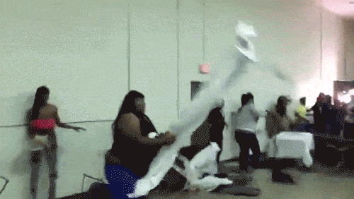 black-chick-throws-a-table-gif