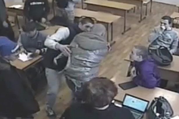 PAY-Russian-teenager-bullied-in-front-of-his-class