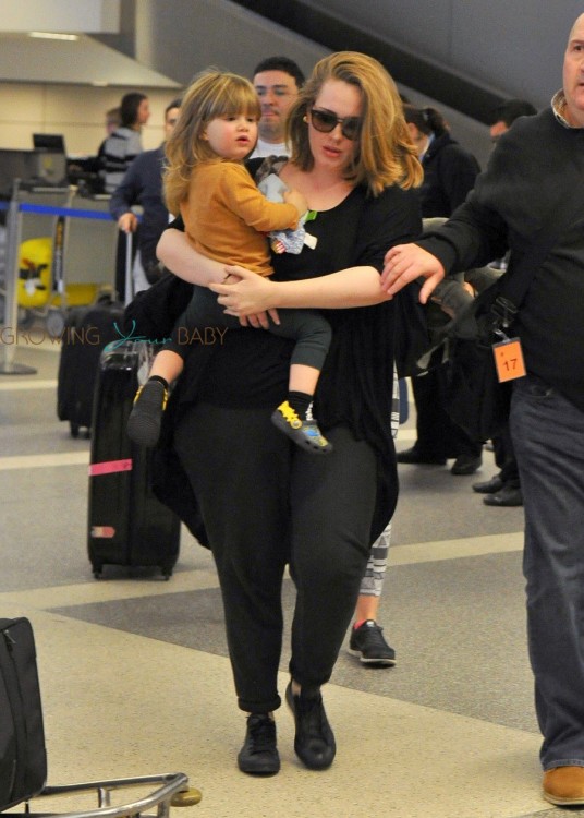 Singer-Adele-and-her-son-Angelo-Konecki-arriving-on-a-flight-at-LAX-536x750