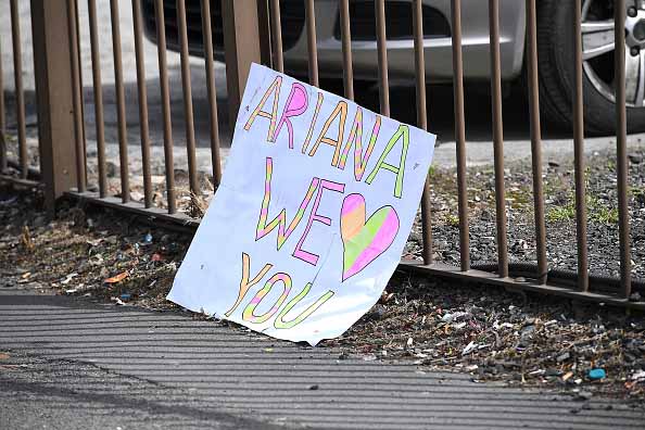MANCHESTER, ENGLAND - MAY 23: A sign saying 'Ariana we love you' is left in the street on May 23, 2017 in Manchester, England. An explosion occurred at Manchester Arena as concert goers were leaving the venue after Ariana Grande had performed. Greater Manchester Police are treating the explosion as a terrorist attack and have confirmed 22 fatalities and 59 injured. (Photo by Leon Neal/Getty Images)