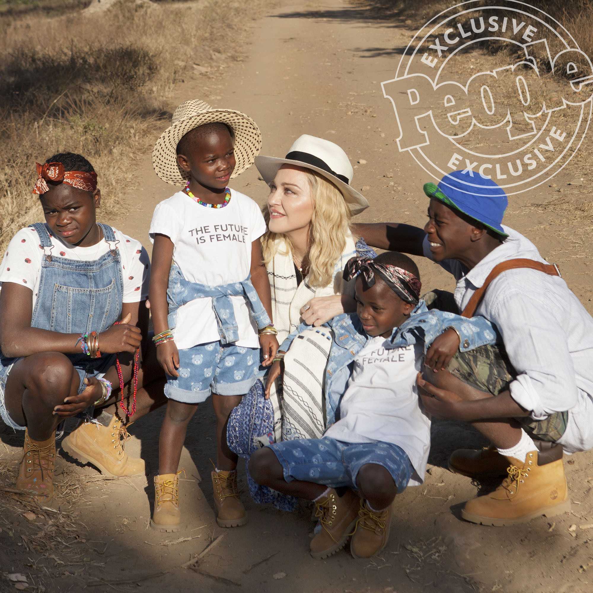 Madonna and family. daughter Mercy James, Son David Banda, twins Estere (with scarf around head as headband) and Stella (in hat) Older kids Rocco & Lourdes Photographed in Malawi at for the opening of Madonna's new hospital there. July 2017. Credit: Shavawn Rissman Do not use without permission from: Approval required for reuse! Brian Bumbery 323.904.9094 Sara Zambreno 310-918-9070